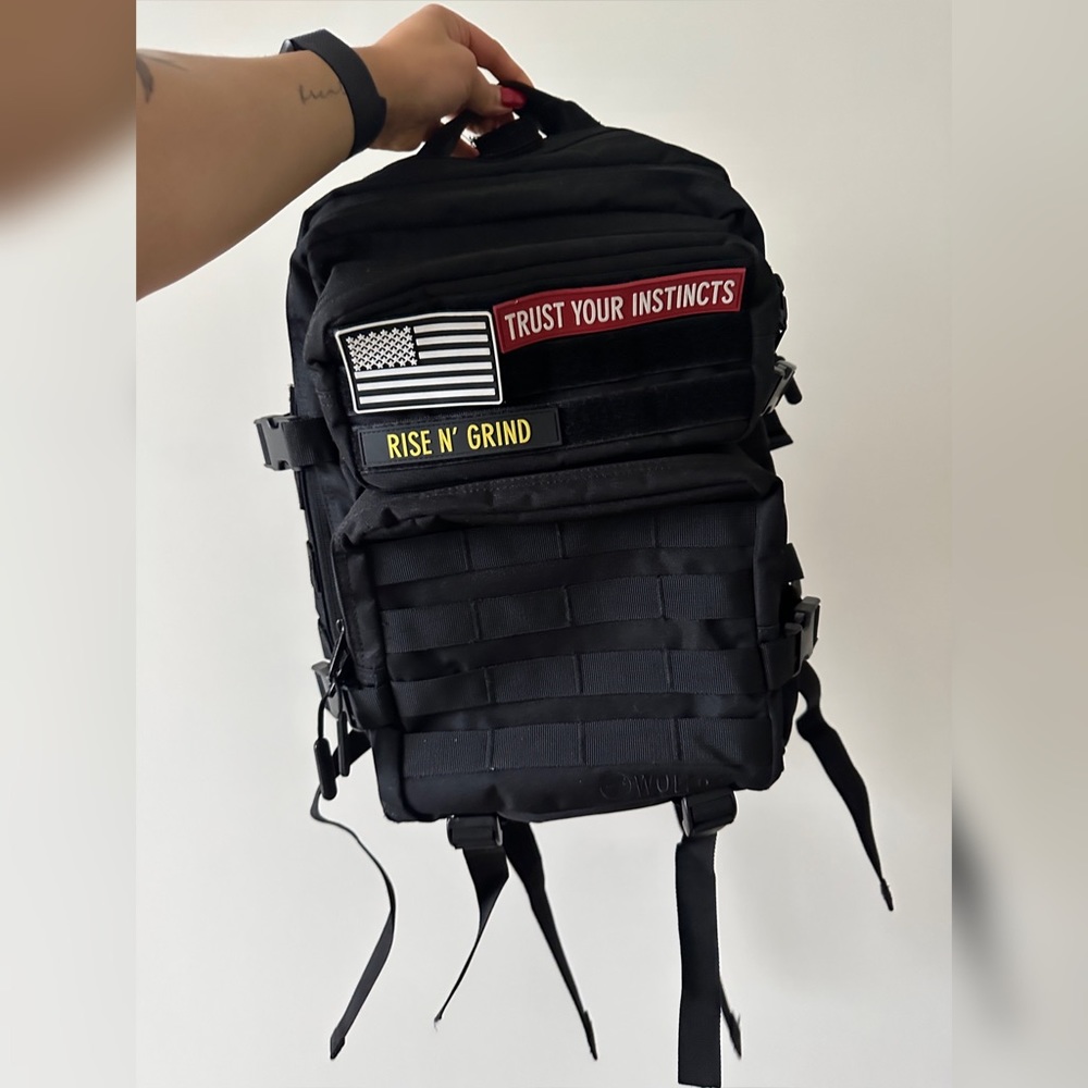 WOLFPAK 25L BACKPACK ALPHA BLACK W/CUP HOLDERS - Originally $89.95 USD